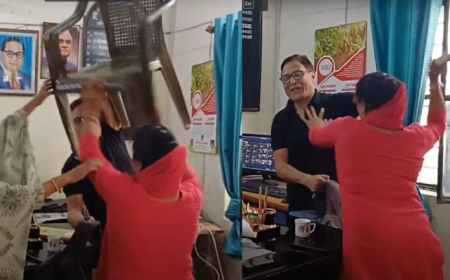 Women Attacks Man with Slippers in Government Office Over Molestation Allegations